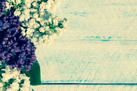 flowers on wooden background. top view copy space.の写真素材