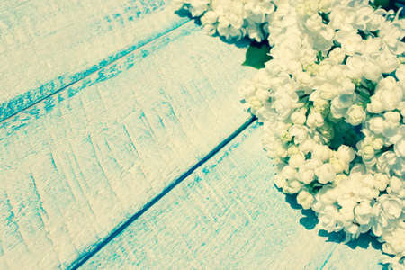 lilac flowers on wooden table. copy space.の写真素材