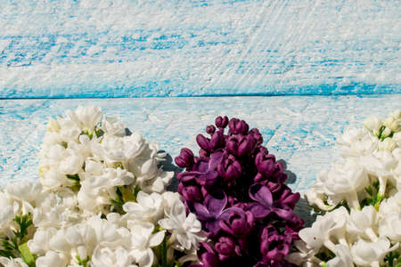 lilac flowers on wooden table. copy space.の写真素材