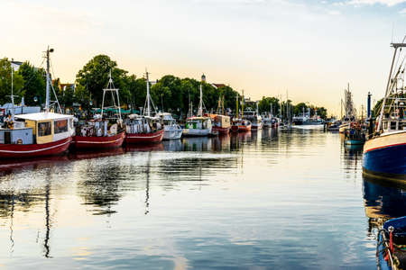 canal with ships and Baltic Sea in Warnemuende, Rostock Germanyの写真素材