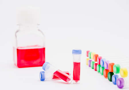 Chemical tubes and flasks with colorful liquids and reagents. Medical laboratory research. drug discovery, pharmacology and biotechnology concept. science and research background with copy space.の写真素材