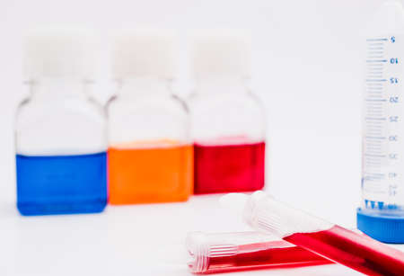 Chemical tubes and flasks with colorful liquids and reagents. Medical laboratory research. drug...