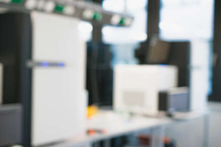 Laboratory interior out of focus. blur image of modern medical, biological or chemical laboratory with next generation sequencer. pharmacy background. template for poster or webpage.の写真素材