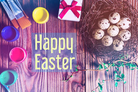 Happy Easter! Easter greeting card. quail eggs in the nest.の写真素材