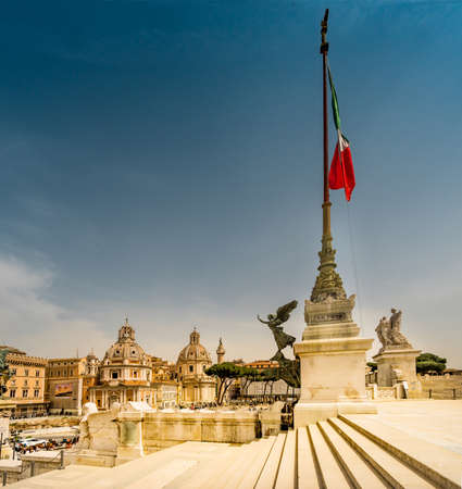 Roma, Italy - april 17, 2018: View to Piazza Venezia with Church of the Most Holy Name of Mary at the Trajan Forum with Trajans Column and angel statue over the city. Italy capital landmarks.のeditorial素材
