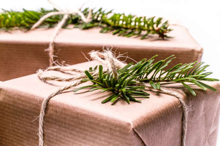 christmas gifts. Xmas gifts on white background. christmas presents with Fir tree branches.の写真素材