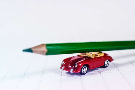 Back to School and Education concept. color pencil on toy car on wooden background. school cardの写真素材