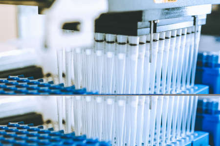 Automation in the clinical laboratory. Pipetting robot laboratory. Medicine robotics. Research and science roboticsの写真素材