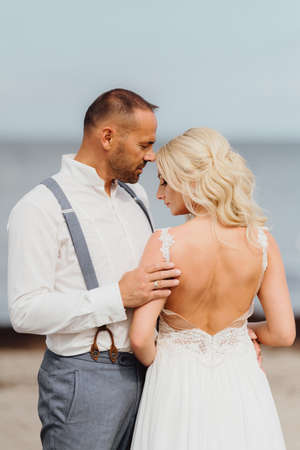 happy newly married couple on the beach. Wedding on the beachの写真素材