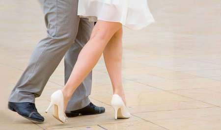 Dancing tango. Street dancers performing tango danceの写真素材