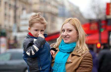 Happy mother and son in Parisの写真素材