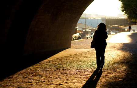 Girl walking in Paris at early morningの写真素材