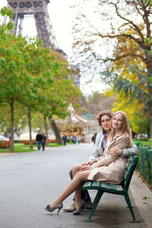 Romantic couple in Paris by the Eiffel Towerの写真素材