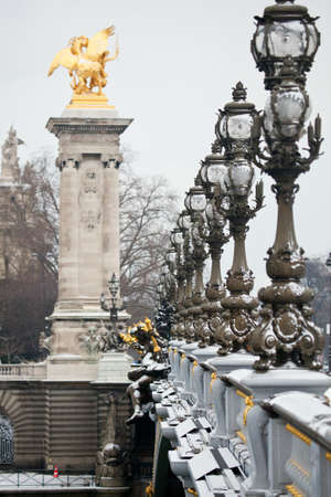 Winter in Paris. Pont Alexandre III under snowの写真素材
