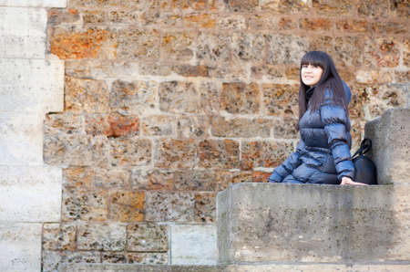 Beautiful brunette girl at Parisian embankmentの写真素材