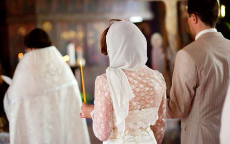 Bride and groom during orthodox wedding ceremonyの写真素材