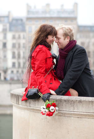 Beautiful romantic couple having a date in Parisの写真素材