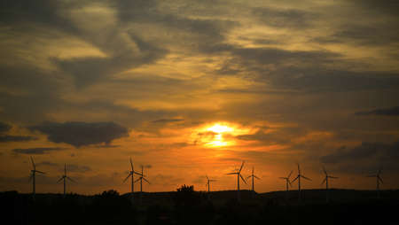 Wind farms against the sunset