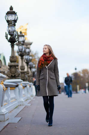 Beautiful girl walking in Parisの写真素材