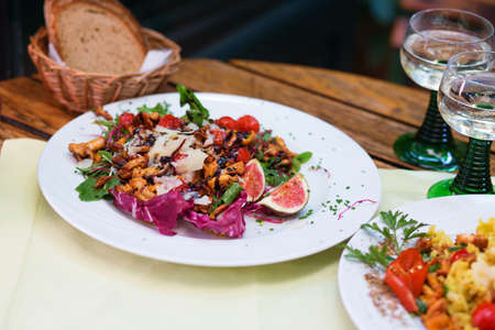 Delicious salad with chanterelles and figuesの写真素材