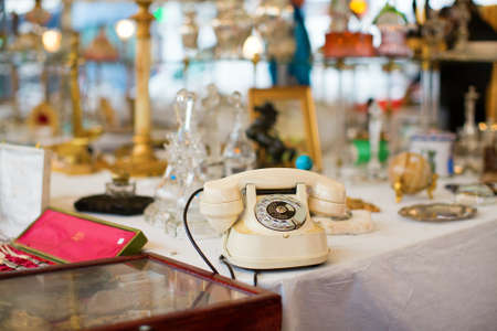 Vintage telephone on a Parisian flea marketの写真素材