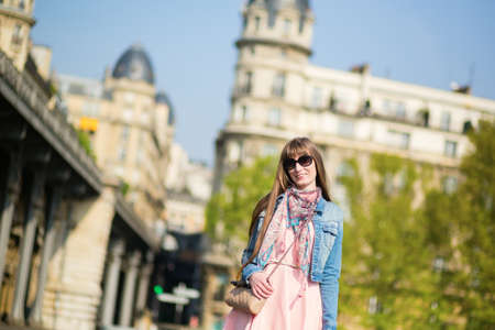 Beautiful young girl walking in Parisの写真素材