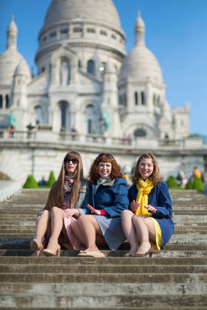 Friends in Paris near the basilica Sacre-Coeur on Montmartreの写真素材