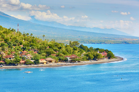 Scenic beach landscape in Amed, Bali, Indonesiaの写真素材