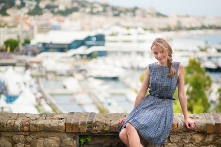 Young beautiful woman on Le Suquet hill in Cannes, Franceの写真素材