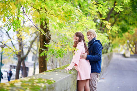 Young dating couple in Paris on a nice spring dayの写真素材