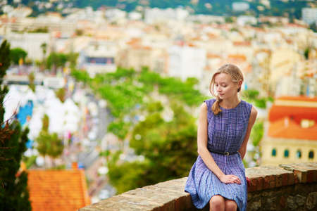 Young beautiful woman on Le Suquet hill in Cannes, Franceの写真素材