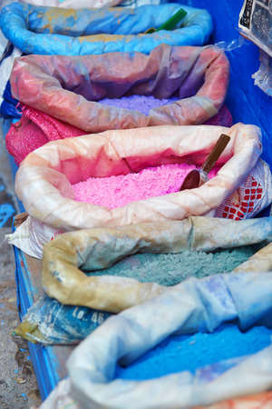 Colorants for sale on a street in Medina of Chefchaouen, Morocco, small town in northwest Morocco known for its blue buildingsの写真素材