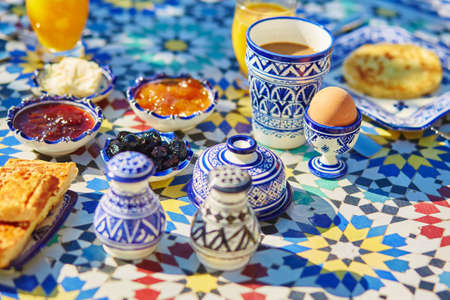 Delicious breakfast in Moroccan style served in riad (traditional Moroccan hotel)の写真素材