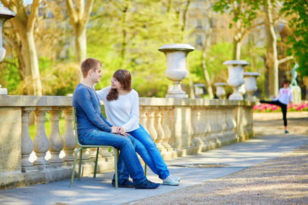 Young romantic couple in Paris, having a date in the Luxembourg gardensの写真素材