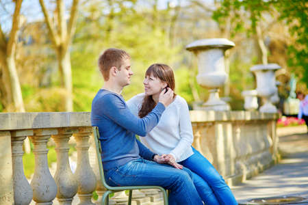 Young romantic couple in Paris, having a date in the Luxembourg gardensの写真素材