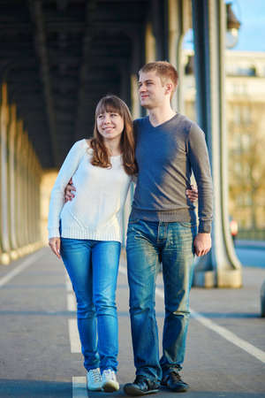 Young romantic couple in Paris on the Bir Hakeim bridgeの写真素材
