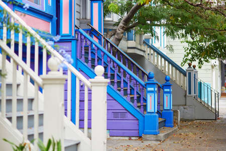 Colorful porches of wooden houses on street of San Francisco, California, USAの写真素材