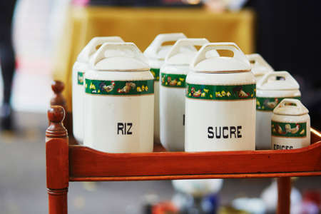 Cans for rice and sugar on a Parisian flea marketの写真素材