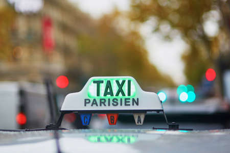 Green taxi sign in Paris, Franceの写真素材