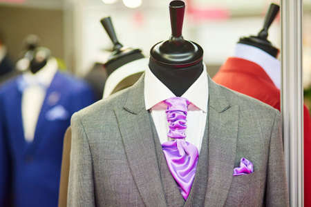 Groom's wedding suit with purple tie on a mannequinの写真素材
