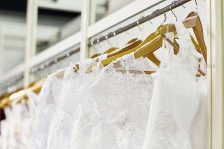 Collection of elegant wedding dresses in the shopの写真素材