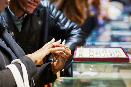 African American couple selecting a wedding ringの写真素材