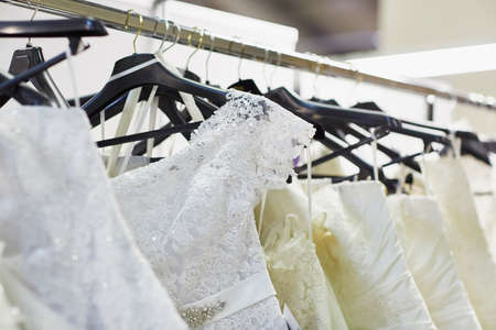 Collection of elegant wedding dresses in the shopの写真素材