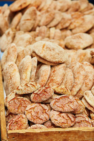Selection of bread on a traditional Moroccan market (souk) in Essaouira, Moroccoの写真素材