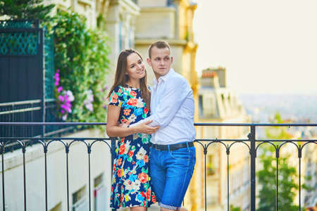 Young romantic couple having a date on a street of Montmartre in Paris, Franceの写真素材