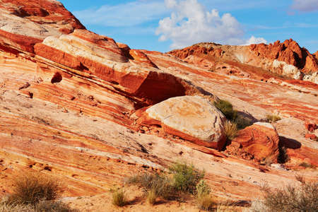 Scenic landscape with striped colorful sedimentary rocks in Valley of the Fire national park in Nevada, USAの写真素材
