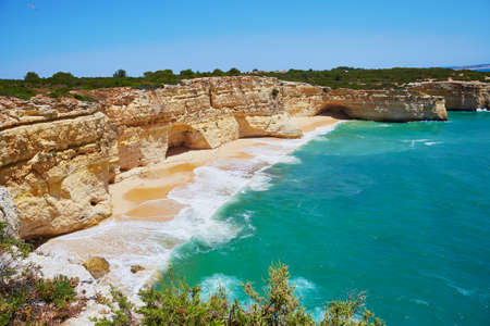 Scenic landscape with ocean, sand beaches and rocks in Algarve, Portugalの写真素材