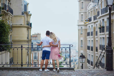 Romantic couple walking on Montmartre in Paris, Franceの写真素材