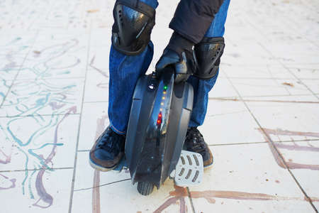 Man legs on mono wheel. Personal electrical transport conceptの写真素材