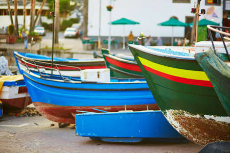 Colorful fishing boats on beach in Camara de Lobos, Madeira, Portugalの写真素材